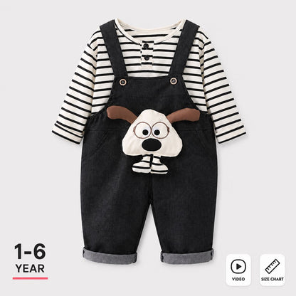 A baby boy's two-piece outfit featuring a black and white striped long-sleeve shirt under dark denim-style overalls with a dog face applique on the front. The image includes '1-6 YEAR' text on the bottom left and 'VIDEO' and 'SIZE CHART' icons on the bottom right, set against a light gray background.