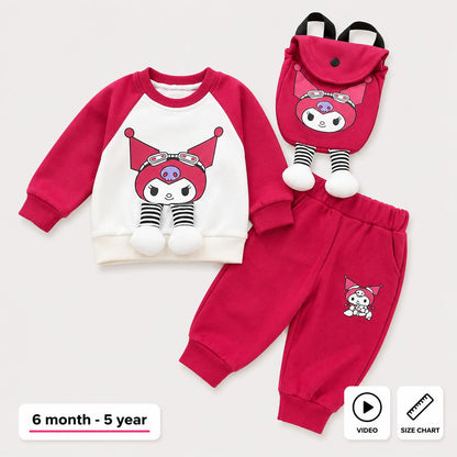 A children's three-piece outfit set featuring a long-sleeve raglan sweatshirt, matching jogger pants, and a small backpack, all in a bright pink and white color scheme with cartoon character graphics. The background is a clean, light off-white studio setting.