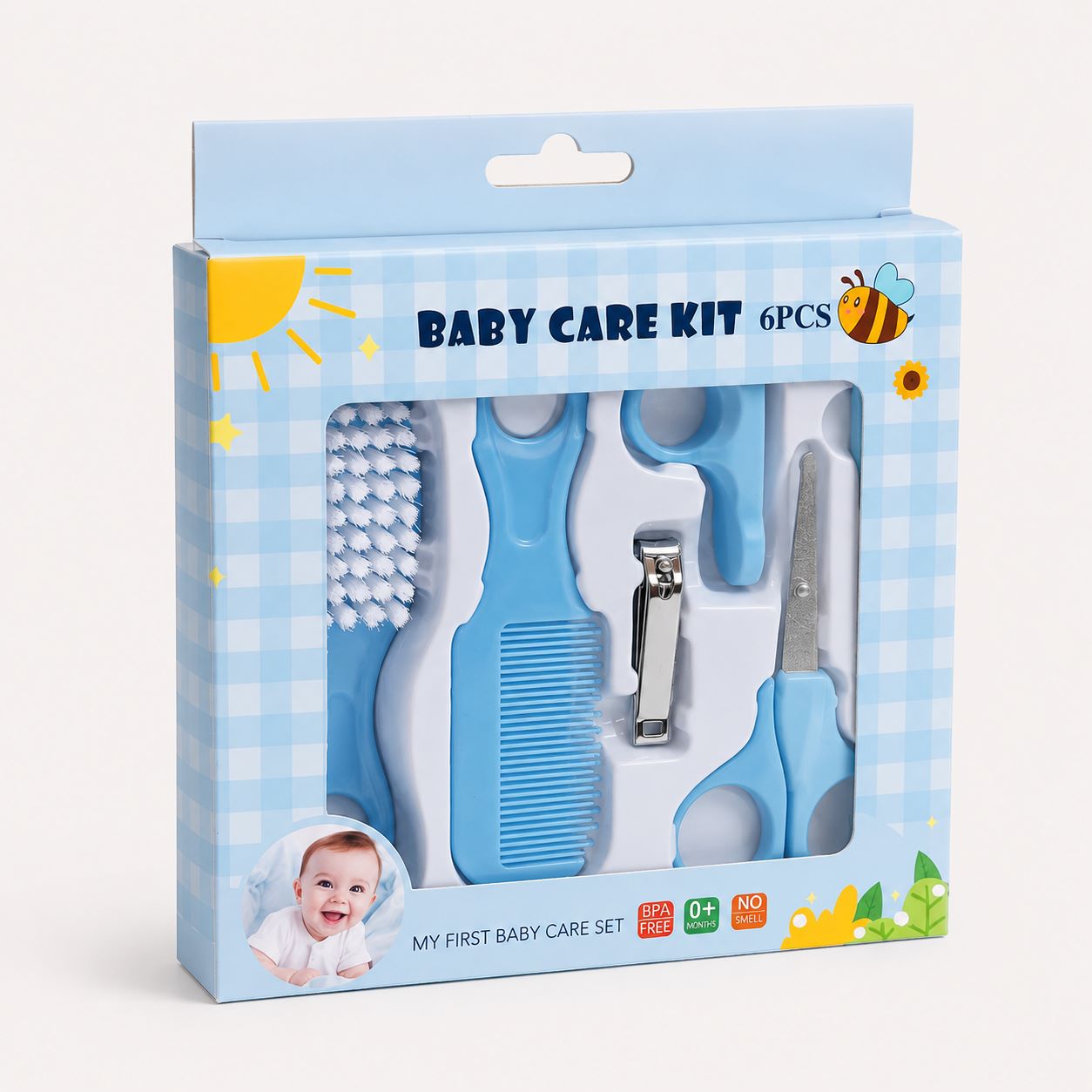Baby care kit 6-piece set in its retail packaging, featuring a light blue and white gingham box with a clear window showing a brush, comb, nail clippers, and nail file.