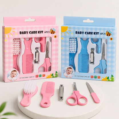 Two baby care kit sets in retail packaging, one pink and one blue, with matching pink tools displayed in front on a white round tray. Imported Baby Care Grooming Kit 6 Pcs