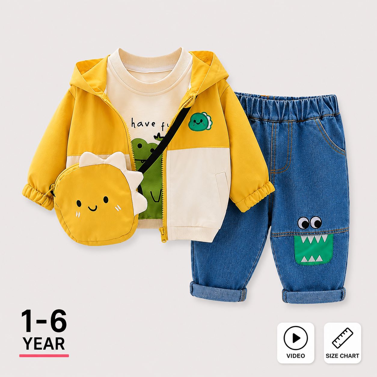 A children's outfit set featuring a yellow hooded zip jacket over a cream graphic shirt, blue denim pants with a green monster patch, and a matching yellow dinosaur-shaped crossbody bag, shown on a light gray background with '1-6 YEAR' and video/size chart icons.