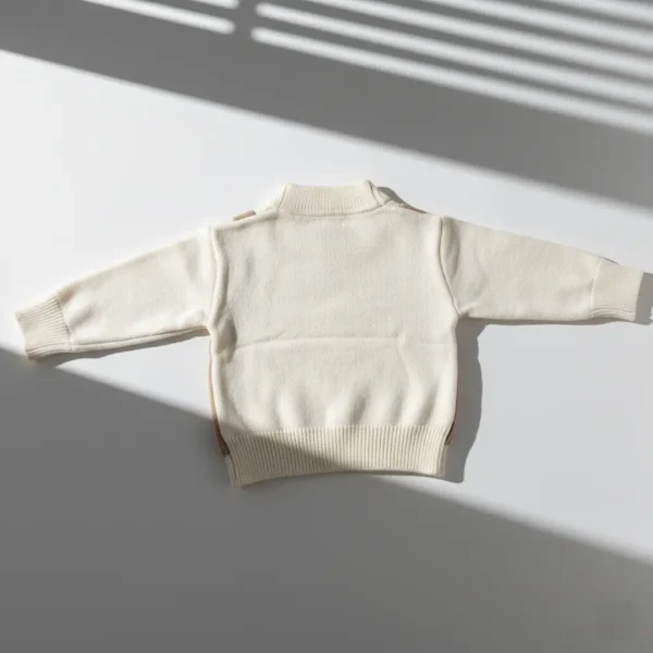 Imported Knitted 2-Piece Winter Outfit – Beige Sweater Vest, Top & Ruffle Pants shirt backside view