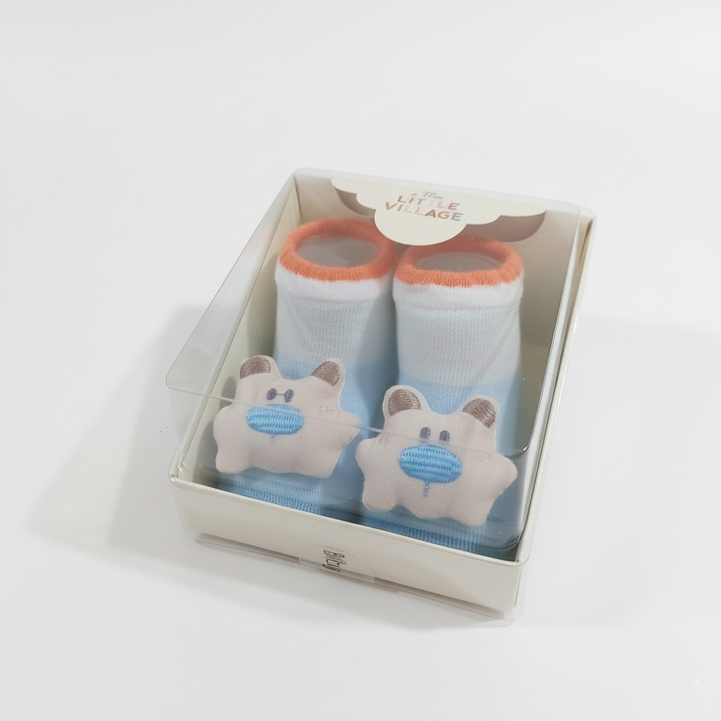 The Little Village Baby Socks (Soft Cotton) – 3D Animal Design box left view